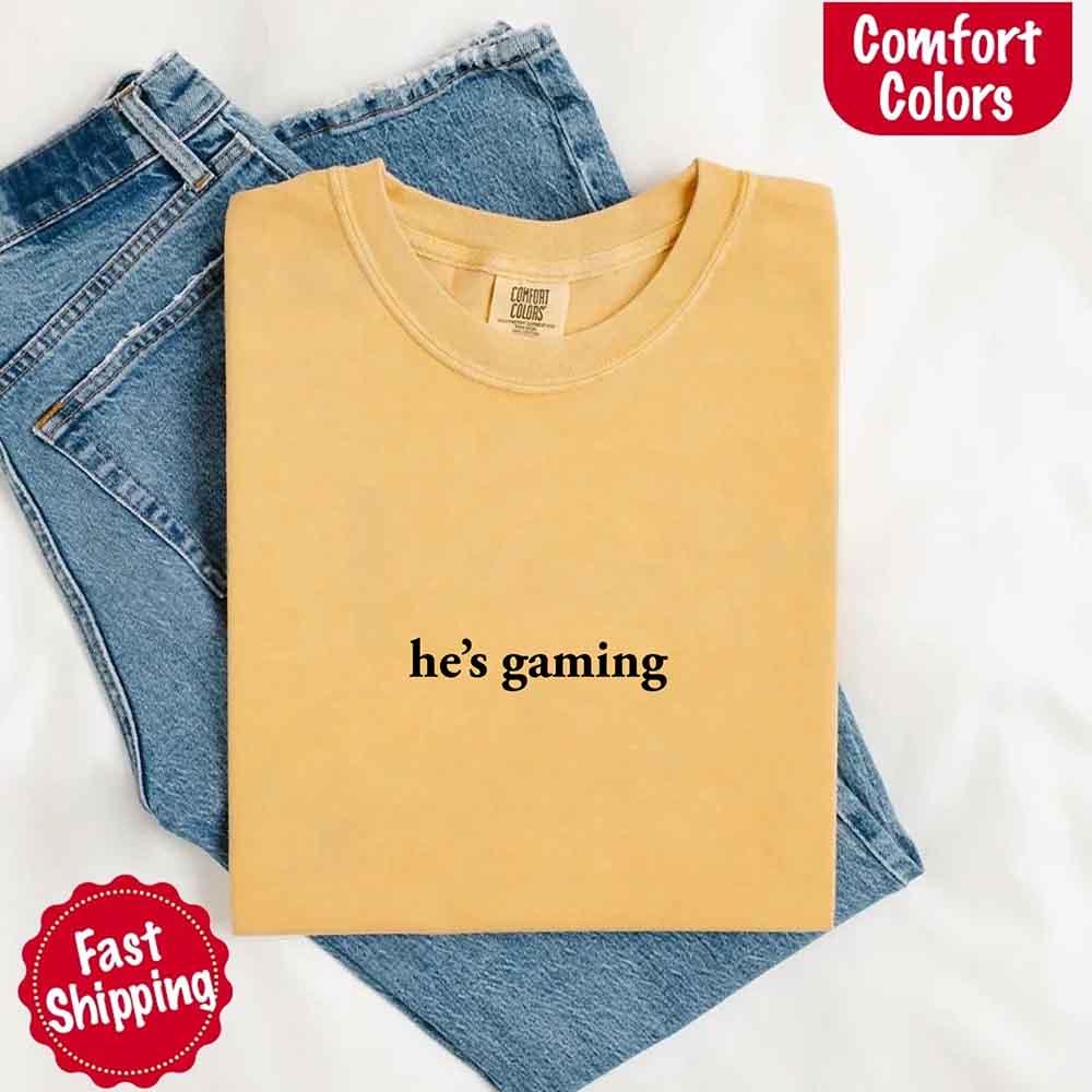 He’s Gaming – Funny Relationship Comfort Color Shirt for Her